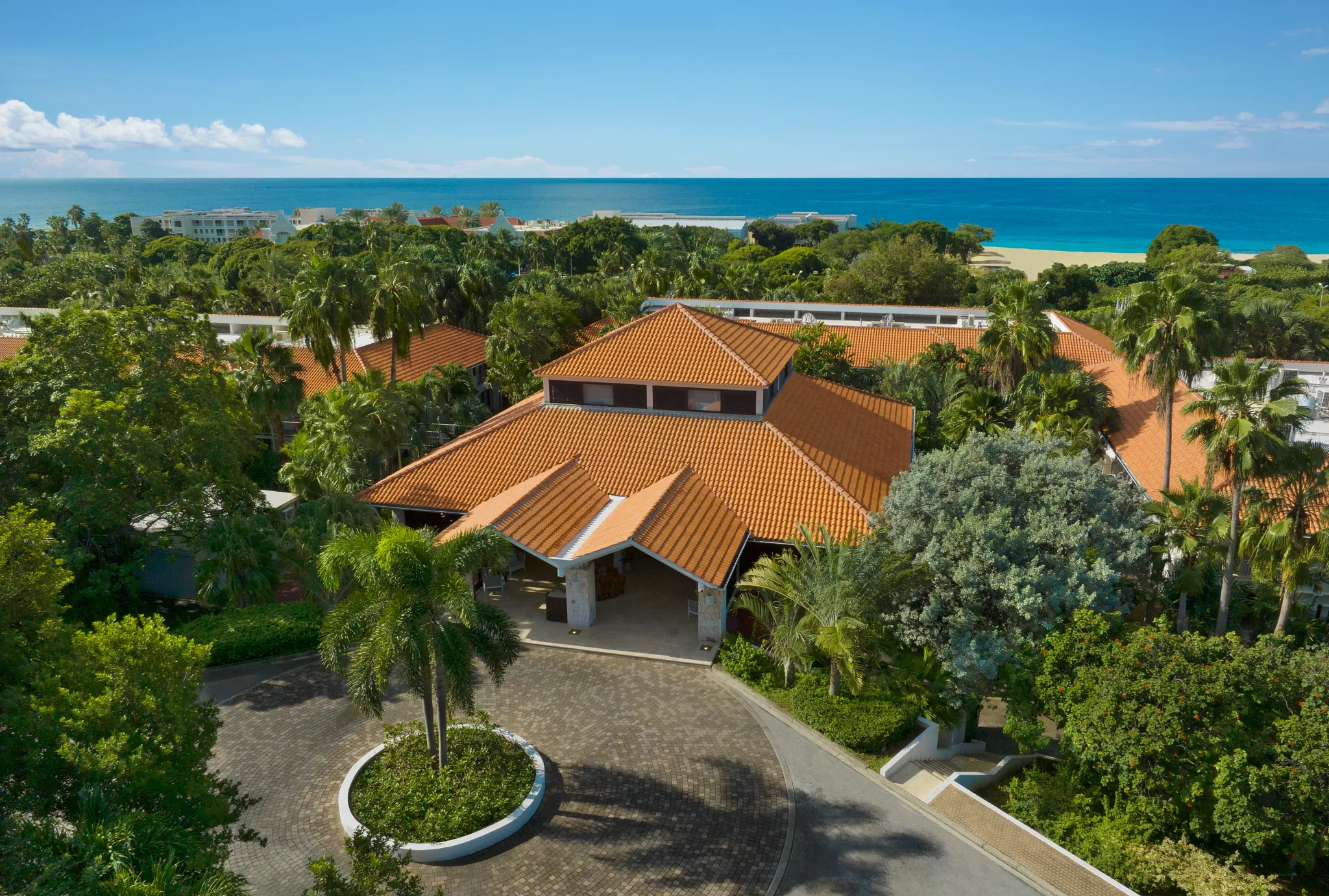 Zoëtry Curaçao Resort & Spa from above, with the sea behind
